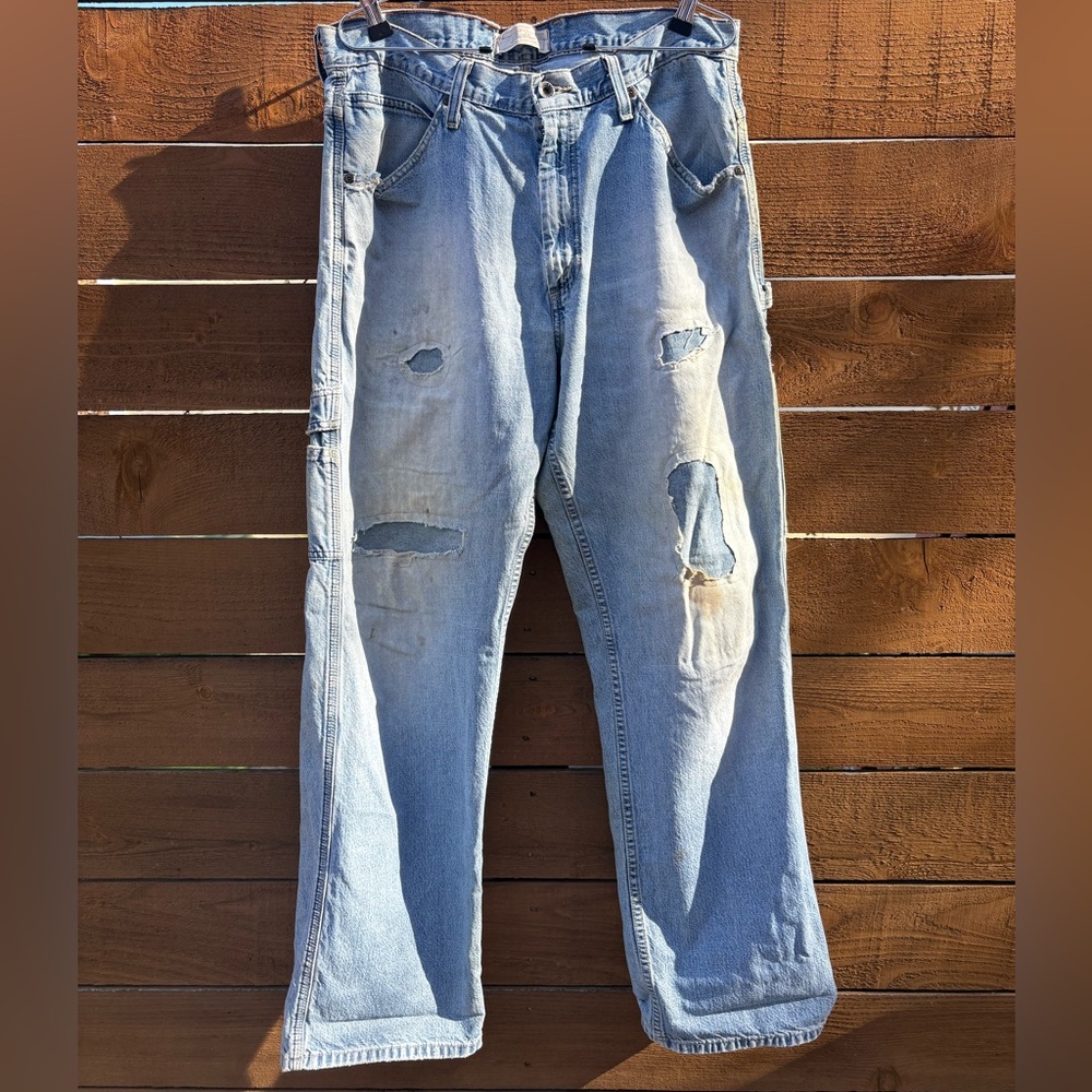 Early 90s Distressed Levi Carpenter Jeans